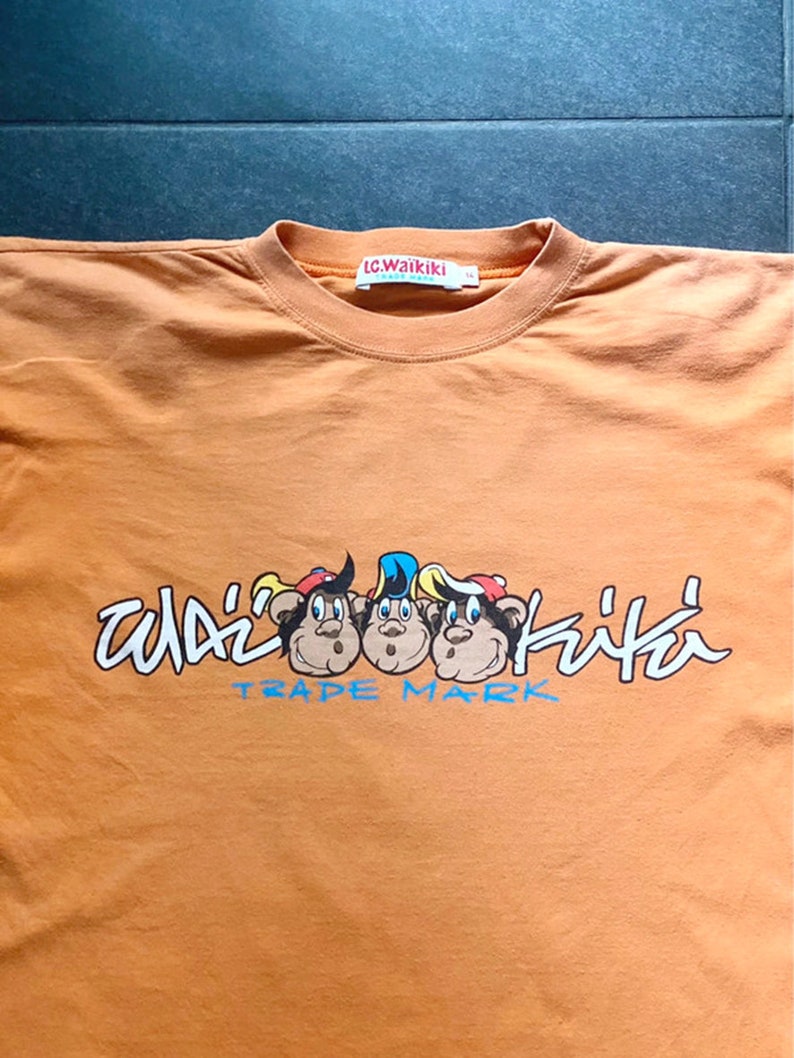 T-shirt LC Waikiki Boomerang Show Master Orange 14Ans Singe Prints Etiquette OG Vintage Rare France 90s image 2