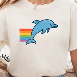 Crayon Trail Dolphin T-Shirt, Colorful Hand-Drawn Style Graphic Tee, Rainbow Sketch Animal Shirt, Cute Dolphin Art, Aesthetic Doodle Apparel