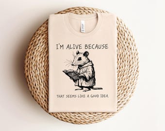 Opos w szacie czytający książkę PNG SVG, żyję, bo to wydaje się dobrym pomysłem Pobierz cyfrowo, Oracle Opossum Humor dla dorosłych PNG