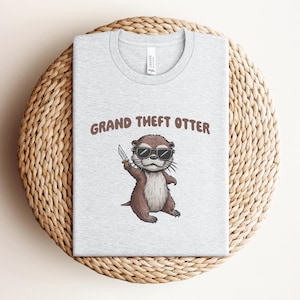 Funny Otter T-Shirt, Grand Theft Otter Meme Tee, Casual Wear TShirt, Meme Otter Shirt, Gift for Him, Otter Pun Shirt, Retro Graphic Tee