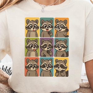 Raccoon Expressions T-Shirt, 9 Chaotic Faces Graphic Tee, Trash Panda Mood Grid Shirt, Animal Meme Design, Colorful Cartoon Raccoon Art