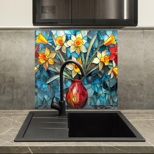 Kitchen wall protection panel featuring floral glass artwork