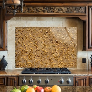May include: A kitchen backsplash with a detailed floral pattern in shades of gold and brown. The backsplash is above a stainless steel gas stove and is framed by dark wood cabinetry.