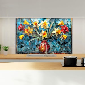 Stained floral glass backsplash wall art behind modern kitchen stove