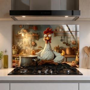 May include: A kitchen splashback panel featuring a cartoon chicken with white feathers and a red comb sitting in a meditative pose on a hob next to a steaming metal pot, set against a background of a rustic kitchen with hanging cookware.