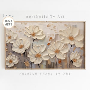 Può includere: Una stampa su tela incorniciata con un dipinto astratto testurizzato di fiori bianchi su uno sfondo beige. Il testo "Aesthetic Tv Art" è in alto nell'immagine e "Premium Frame Tv Art" è in basso.