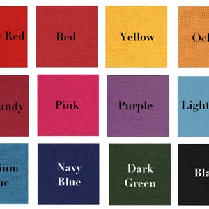 Op de afbeelding: Een kleurenkaart met 12 stofstalen in verschillende kleuren, waaronder vlamrood, rood, geel, oker, bordeauxrood, roze, paars, lichtblauw, middelblauw, donkerblauw, donkergroen en zwart.