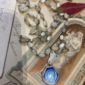 antique madonna necklace