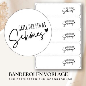 May include: A white label template with the text "GRILL DIR ETWAS Schönes" in black script, accompanied by a small heart. The template includes a circular design and rectangular labels. The text "BANDEROLEN VORLAGE FÜR SERVIETTEN ZUM SOFORTDRUCK" is at the bottom.