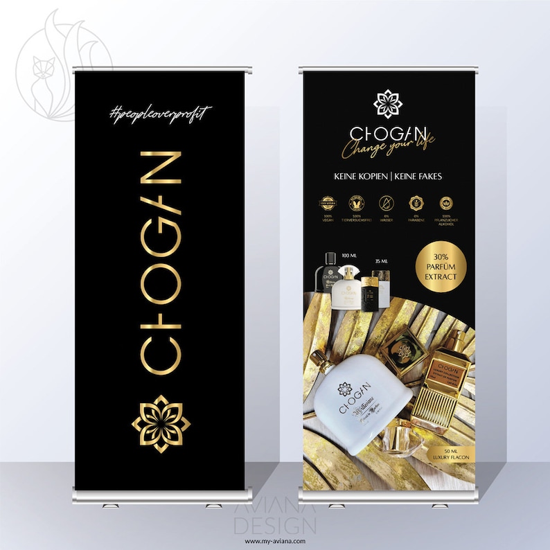 May include: Two black retractable banner stands with gold lettering. The left banner has the text "#peopleoverprofit" and "CHOGAN" in a vertical orientation. The right banner has the text "CHOGAN Change your life" and "KEINE KOPIEN | KEINE FAKES". The banner also features a gold flower logo, a bottle of perfume, and the text "30% PARFUM EXTRACT".