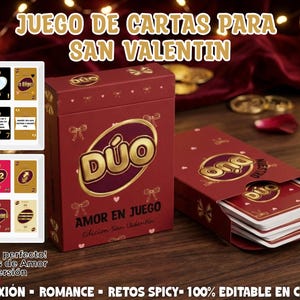 May include: A red card game box with gold lettering and a matching open box with cards. The box reads "Duo" and "Amor en Juego" with the text "Juego de Cartas Para San Valentin" at the top. The game includes 54 cards.