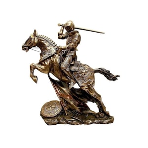 Attacking knight in armor on a horse with a sword, during the battle, with raised sword - symbol of bravery