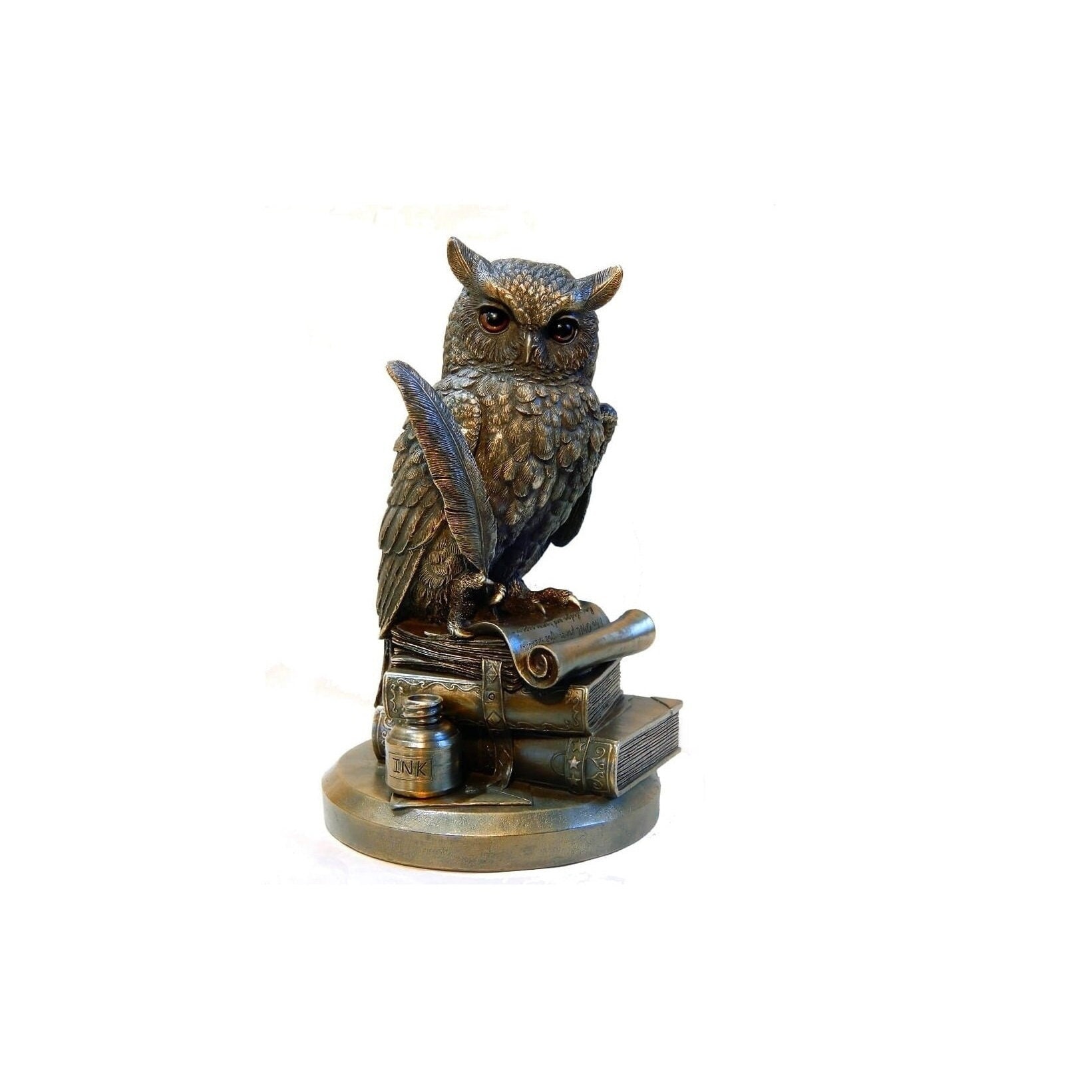Owl on books statue