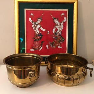 A pair of Vintage brass cachepots/planters/pot