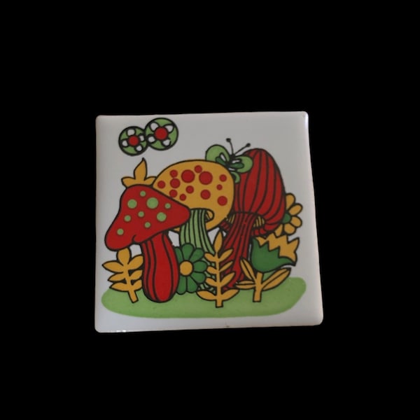 Vintage mushroom and floral ceramic tile