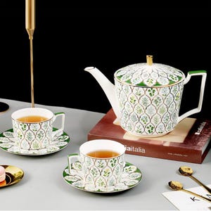 Handgemaakte keramische theeset: koffiekop en schotel - modern servies