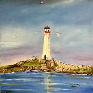 May include: A white lighthouse with a red roof stands on a rocky island in a blue body of water. The sky is a light blue with white clouds. There are several seagulls flying in the sky.