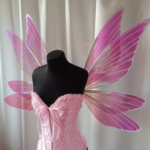 Pink iridescent wings with a white outline, fairy wings for Ren Faire