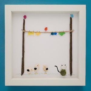 sea glass sea birds, pebble sea birds, handmade wall art, colorful sea birds created out of sea glass with a cat and seagulls out of pebbles