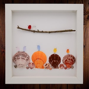 seashell framed art, shadowbox seashell art, seaglass artwork, colorful seashells with colorful birds designed from sea glass