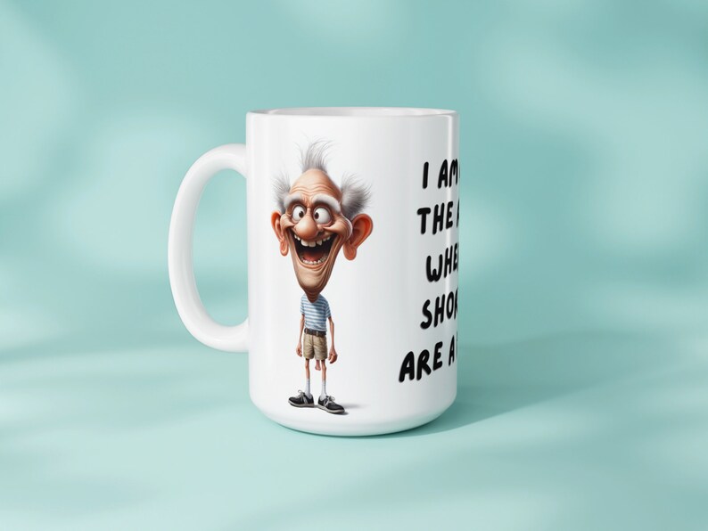 Image of a mug with a sublimation design for 11oz and 15oz sizes featuring a funny old man and the text I am at the age where shorts are a risk The mug is placed against a light blue background to show its physical look