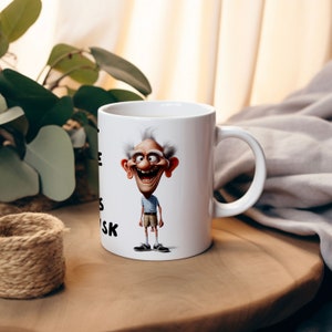 Mockup image showing a sublimation design on an 11oz or 15oz mug featuring a funny old man character with the text I am at the age where shorts are a risk. The mockup image is intended to show how the design will look in real life