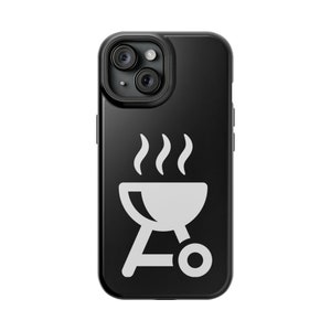 May include: Black phone case with a white grill icon and steam coming from the top.