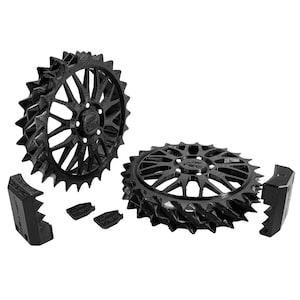 May include: Black, spiky, gear-like components. Two large wheels with multiple spokes and a central hub, along with smaller, rectangular pieces. The components appear to be made of a matte black material, possibly plastic or metal.
