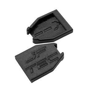 May include: Two black, rectangular plastic pieces with the text "JTEC" printed on one. The pieces have a textured surface and appear to be components of a larger device or product.