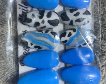 blue almond cow print nails