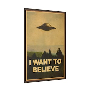 May include: Framed poster featuring a vintage-style image of a UFO hovering above a forest. The text "I WANT TO BELIEVE" is printed in bold, white letters at the bottom. The poster has a brown border.
