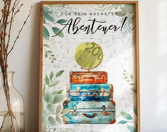 May include: A framed print featuring a stack of vintage suitcases in shades of orange, blue, and teal. A globe sits atop the suitcases. The print has the text "FÜR DEIN NÄCHSTES Abenteuer!" in a decorative font, with a background of leaves and travel-themed illustrations.