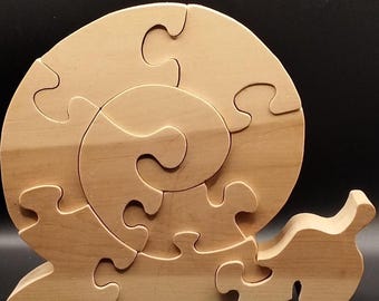 P74-Zirbenholz Puzzle SchneckeZirbenholz Puzzle Schnecke