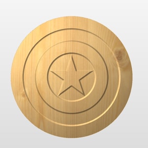 May include: A wooden round shield with a carved star in the center and concentric circles around the star.