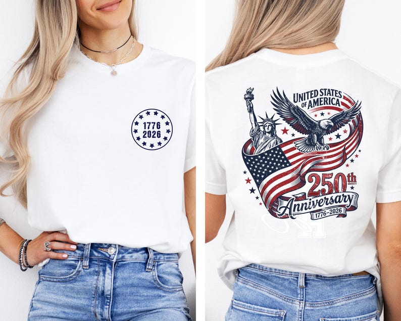 Pode incluir: Camiseta branca com um design circular azul marinho na frente, com o texto "1776 2026". A parte de tr&aacute;s da camisa exibe um gr&aacute;fico patri&oacute;tico com o texto "United States of America 250th Anniversary 1776-2026", com uma &aacute;guia e a Est&aacute;tua da Liberdade.