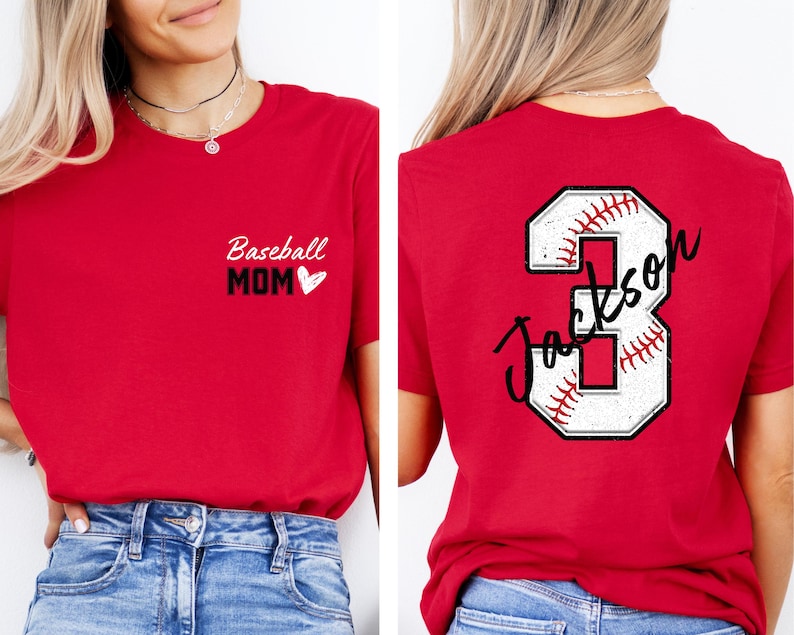 May include: Two red t-shirts. One says "Baseball Mom" with a heart. The other has a white baseball with the number 3 and the name "Jackson" written on it.