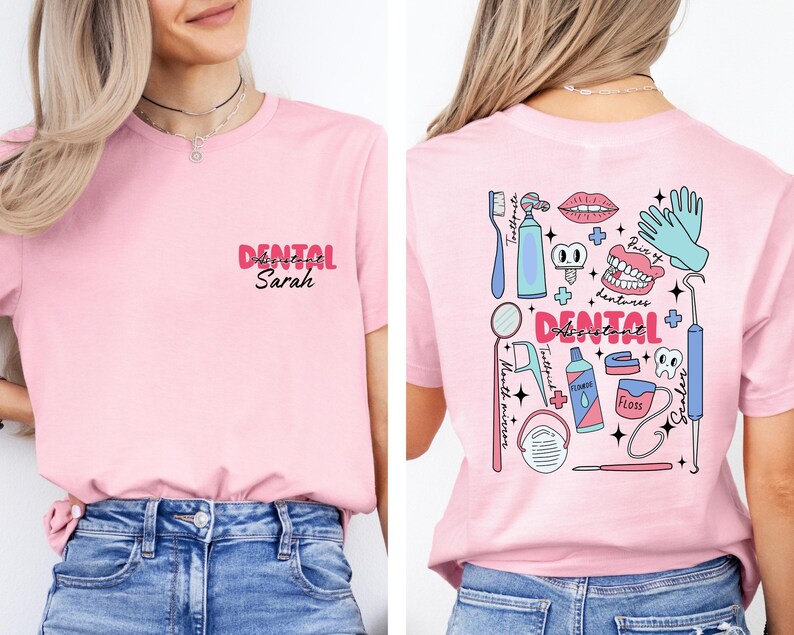 May include: Pink t-shirt with a dental assistant design on the back. The design includes a toothbrush, toothpaste, floss, mouth mirror, dental tools, and a pair of dentures. The front of the shirt says "Dental Assistant Sarah".