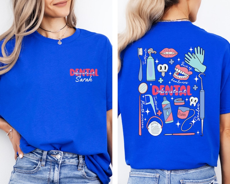 May include: A royal blue t-shirt with a dental assistant design on the back. The design features a variety of dental tools, including a toothbrush, toothpaste, floss, and a mouth mirror. The text "Dental Assistant" is written in pink and white letters. The front of the shirt has the text "Dental Assistant Sarah" in pink and white letters.