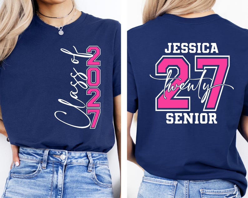 May include: Navy blue t-shirt with the text "Class of 2027" in white script and pink block letters. The back of the shirt features the name "Jessica", the number "27", and the word "Senior".