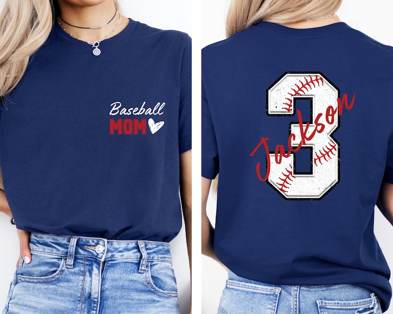 May include: Two navy blue t-shirts. The front of one shirt says "Baseball Mom" with a heart. The back of the other shirt has a white baseball number 3 with red stitching and the name "Jackson" written in red cursive.