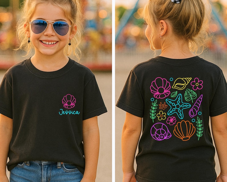 May include: Black t-shirt with a seashell design and the name "Jessica" in teal. The back of the shirt features a colorful neon design of seashells, starfish, and flowers. The shirt is worn by a young person.