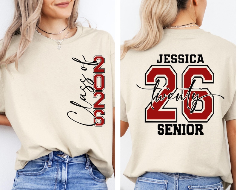 May include: Cream-colored t-shirt with "Class of 2026" in black script and red block letters. The back of the shirt features the name "Jessica", the number "26", and the word "Senior" in black and red.