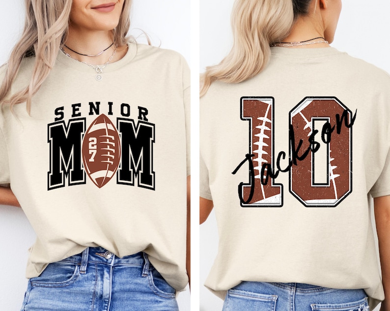 May include: A beige t-shirt featuring a front graphic with the text SENIOR MOM and a football icon with the number 27. The back graphic displays the number 10 with a football texture and the name Jackson written in black script across the center.
