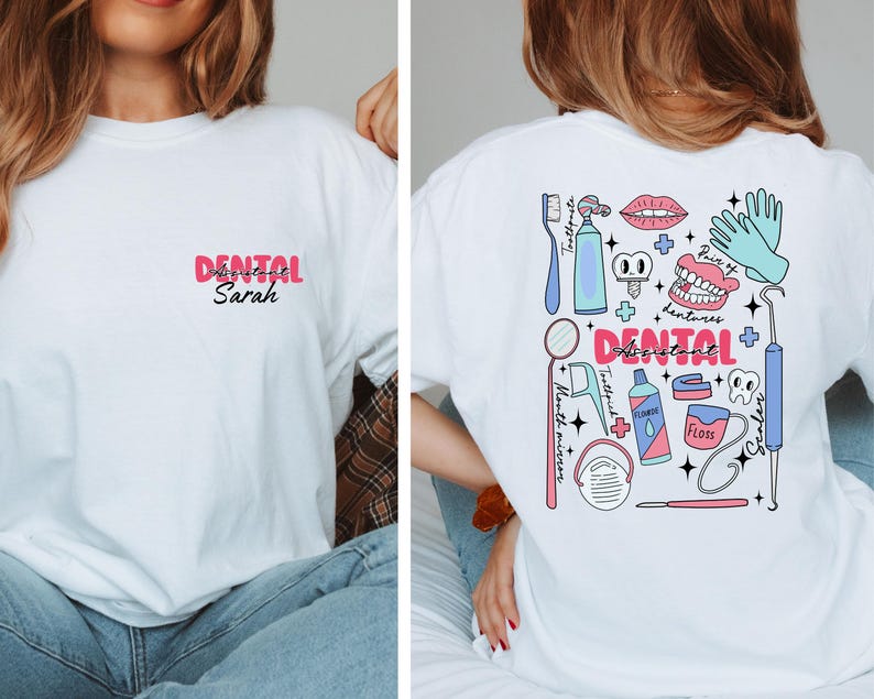May include: White t-shirt with a pink and black design that says "Dental Assistant Sarah" on the front and a colourful illustration of dental tools and equipment on the back.
