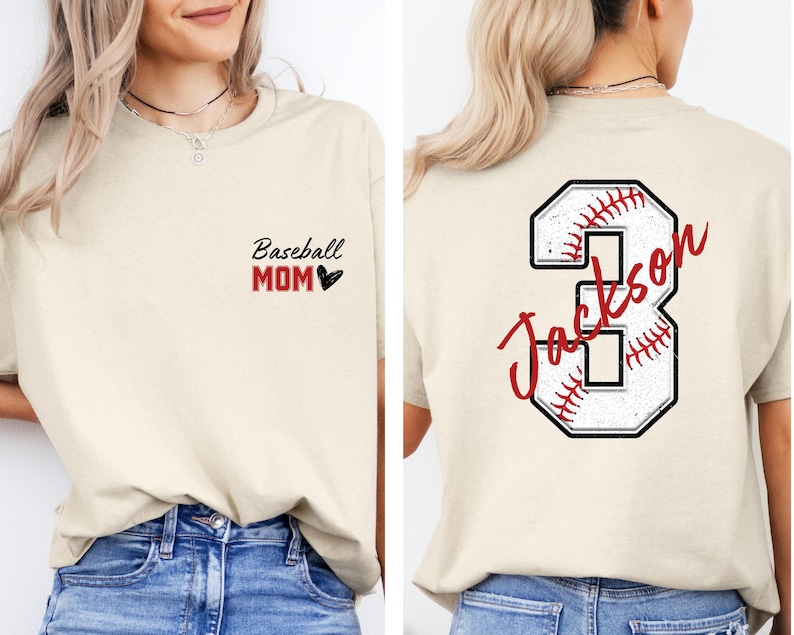 May include: A beige t-shirt with the text "Baseball Mom" and a small red heart on the front. The back of the shirt has a large white number 3 with a red baseball stitched design and the text "Jackson" in red cursive writing.