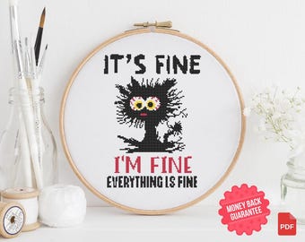 May include: Cross stitch pattern featuring a black cat with a distressed look and the text "It's fine, I'm fine, everything is fine".