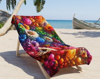 Puede incluir: Una silla de playa colorida con un patrón floral. La silla está hecha de madera y tiene un asiento y un respaldo de tela. La silla está en una playa de arena con una palmera en el fondo.
