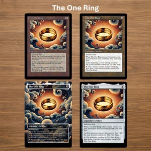 May include: Four trading cards featuring "The One Ring" with a golden ring design. Each card has a different background color and includes text describing the card's abilities. The cards are arranged on a wooden surface.
