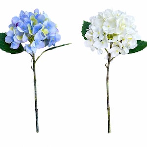 May include: Two artificial hydrangea stems. One features a cluster of blue and yellow flowers with green leaves. The other has a cluster of white flowers with green leaves. Both have brown stems, perfect for floral arrangements.