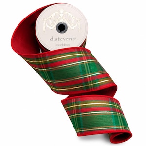 May include: A spool of d.stevens fine ribbons featuring a red and green plaid pattern with thin gold metallic stripes. The ribbon has solid red edges and is wound around a circular cardboard core with a decorative white label on the center.